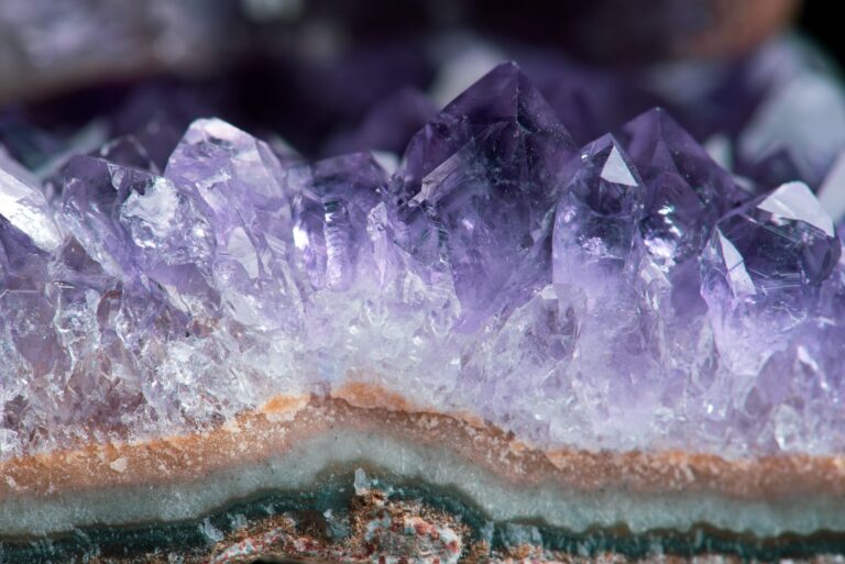 Close-up of purple amethyst crystal formations.