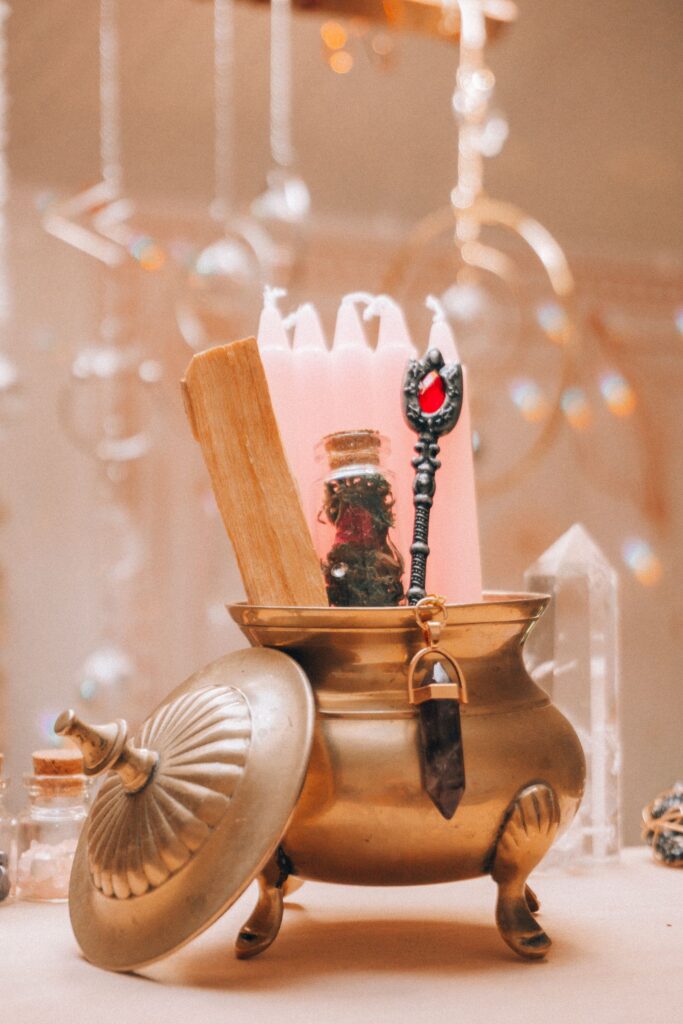 Candles and ritual objects arranged for candle magic timing.