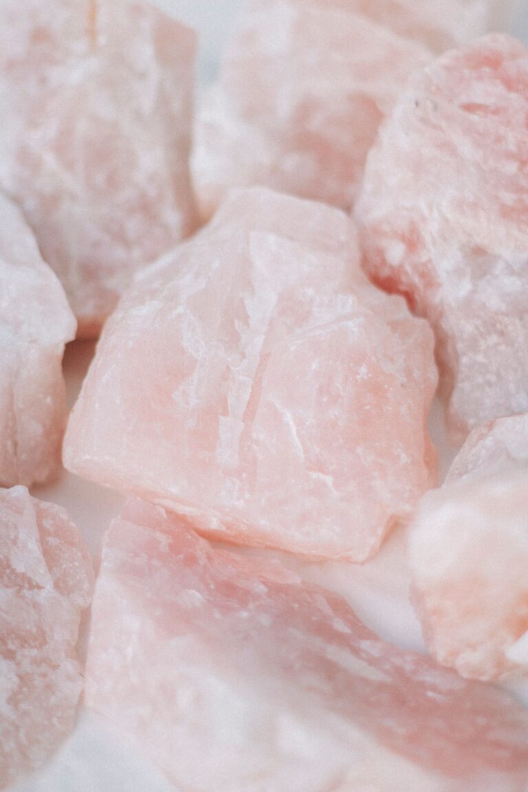 Raw rose quartz crystals for love and compassion magic.